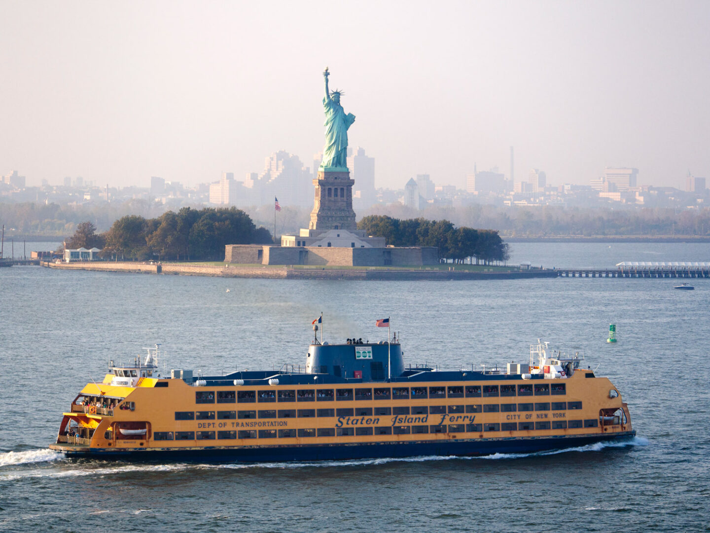 Ferry passing the Statue of Liberty