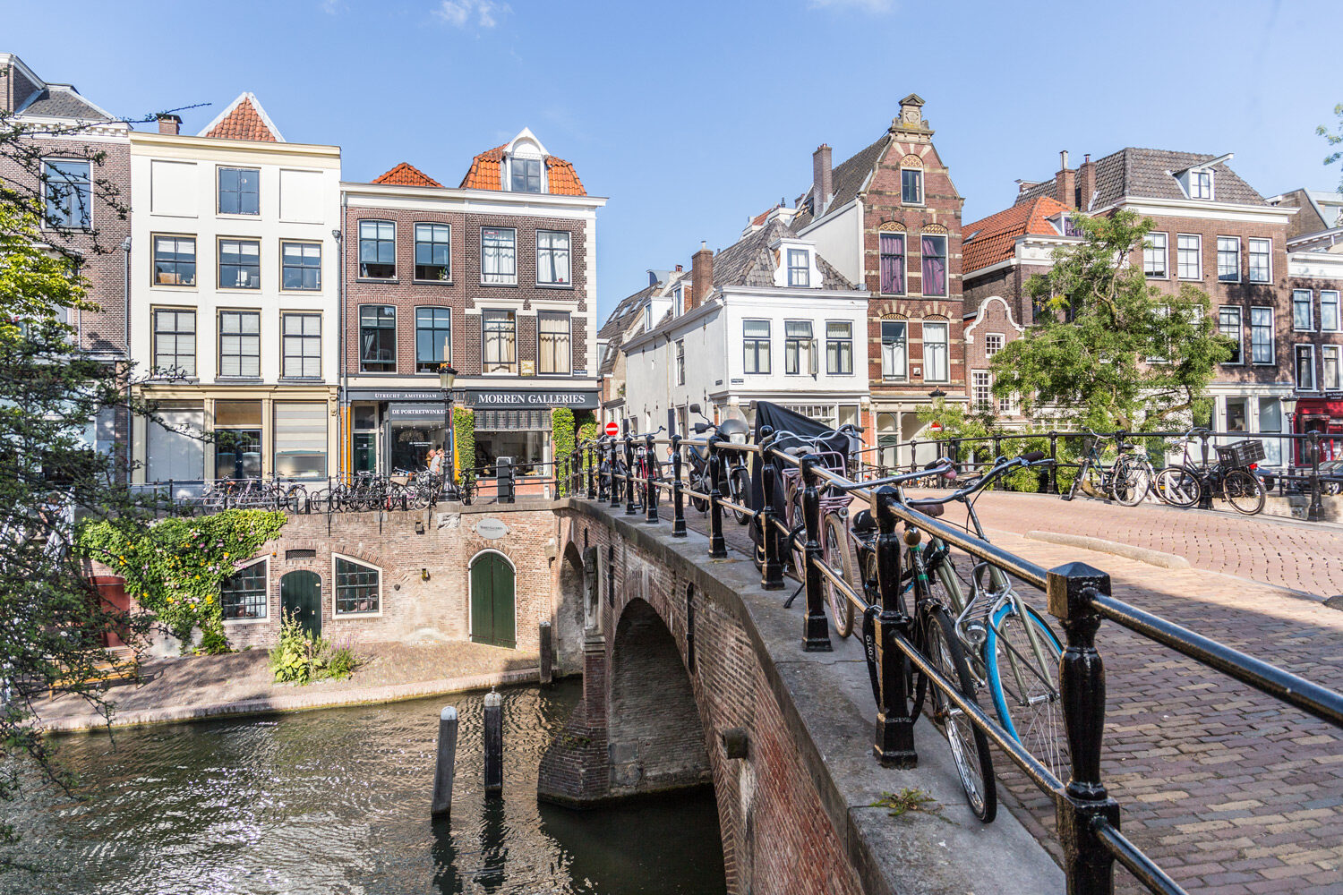 Bridge Over Canal Amidst Buildings