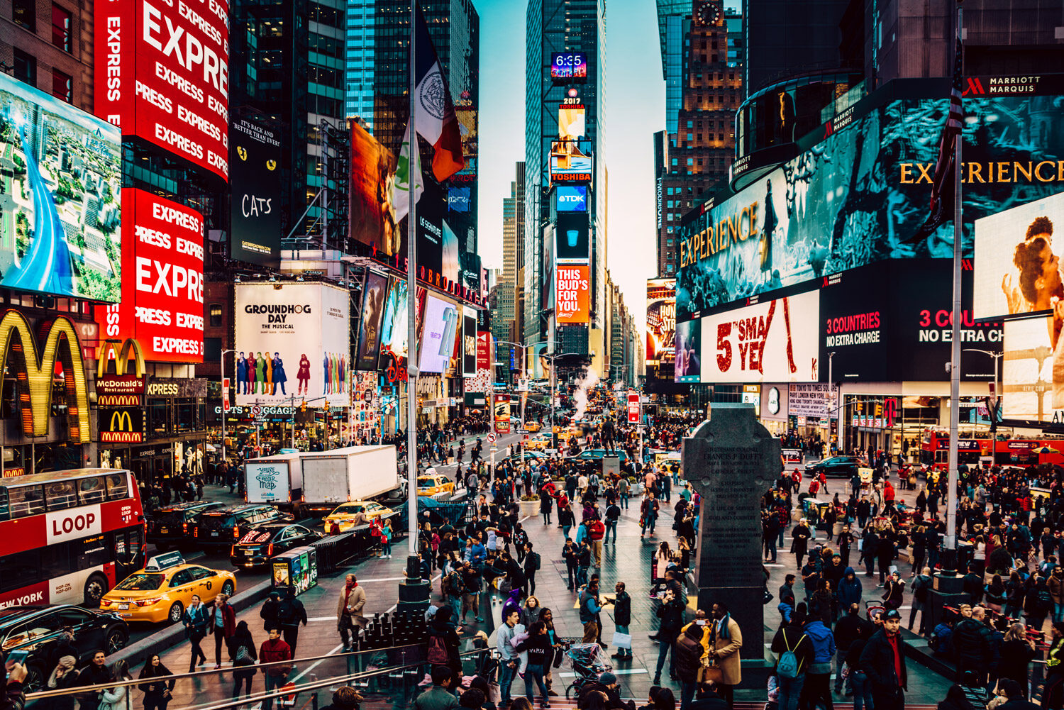 Manhattan's iconic Times Square and Theater District seen in the evening, view bearing South.