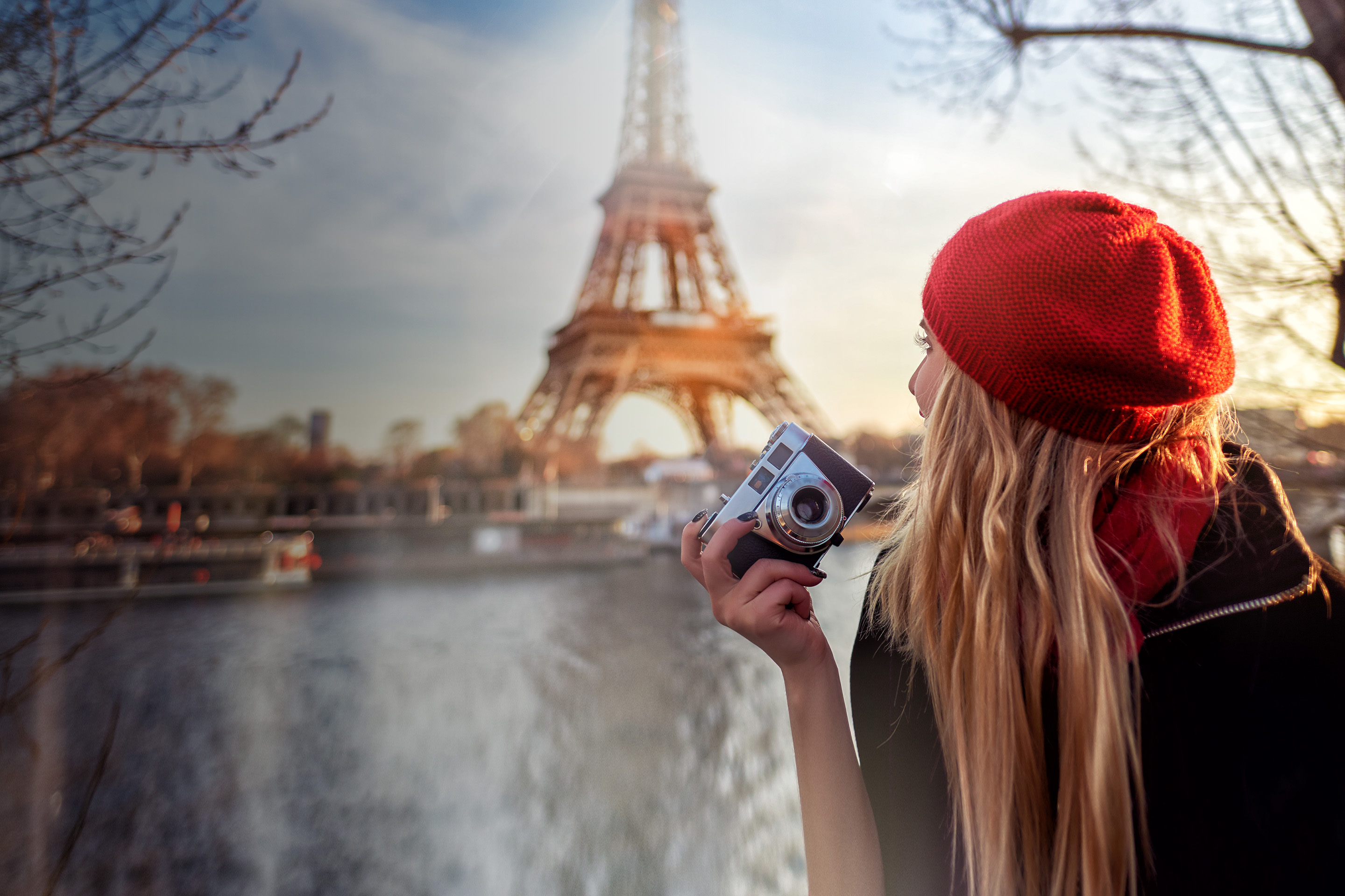 Girl with camera in Paris